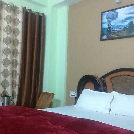 Hotel Mansarovar Banjār Buitenkant foto